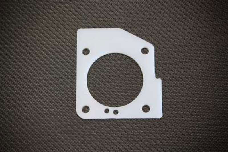 Torque Solution ts-tbg-013 | Thermal Throttle Body Gasket: DSM Eclipse / Talon 2nd Gen 4G63 Turbo Only