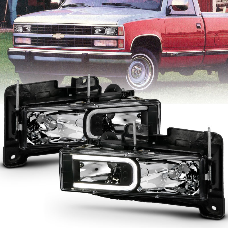 ANZO 111498 | 1999-2000 Cadillac Escalade Crystal Headlights Light Bar Black Housing (Pair); 1999-2000