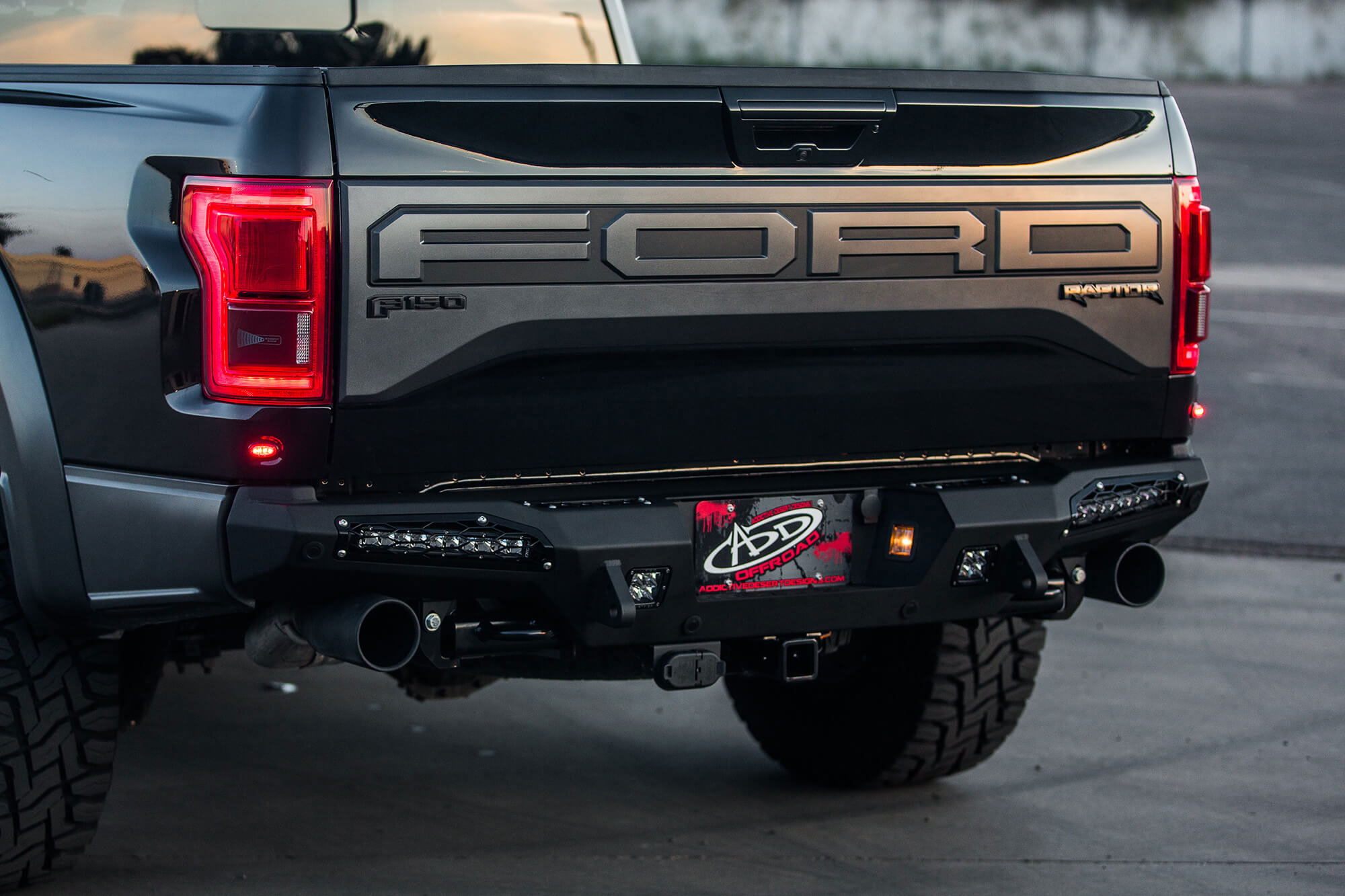 Addictive Desert Designs R117321430103 | Ford F-150 Raptor HoneyBadger Rear Bumper w/ 10in SR LED Mounts; 2017-2018