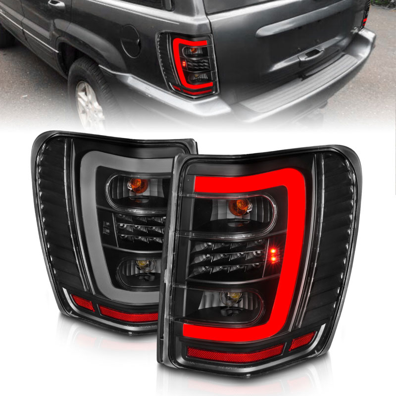 ANZO 311394 | 1999-2004 Jeep Grand Cherokee LED Tail Lights w/ Light Bar Black Housing Clear Lens; 1999-2004