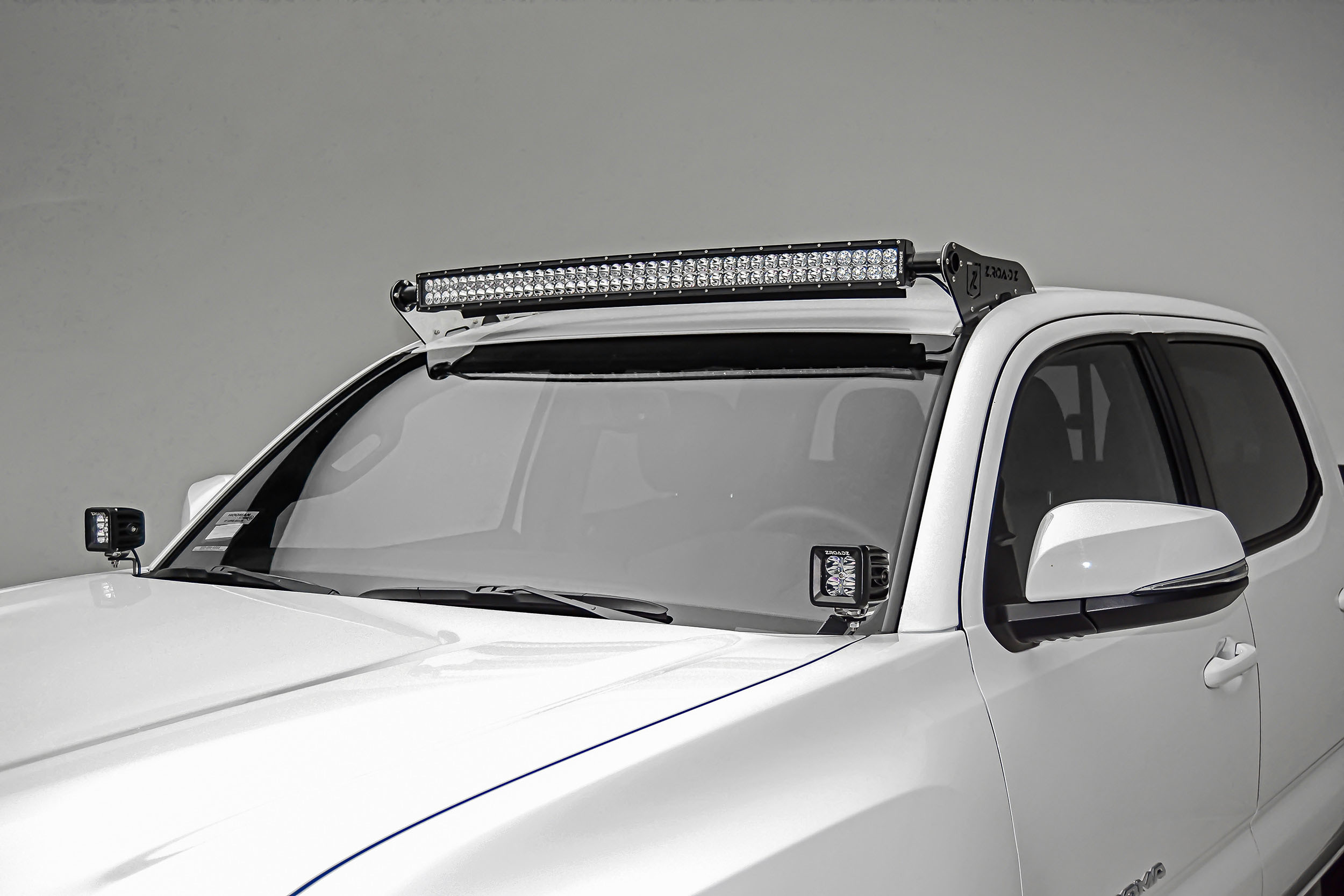 T-Rex z369401 | Zroadz T-Rex 2016-2017 TOYOTA TACOMA: Hood Hinges LED Light Bar Mounts - By A Pillar - for mounting Two 3 IN Zroadz Cube Pod Work Lights or Similar Style Light - Bolts On to Hood Hin; 2016-2017