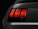 Raxiom 99-04 Ford Mustang Excluding 99-01 Cobra Tail Lights- Black Housing (Smoked Lens); 1999-2004