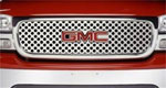 Putco 00-06 GMC Yukon XL - w/ Logo CutOut Punch Stainless Steel Grilles; 2006-2006