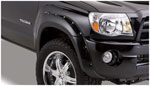 Bushwacker 05-11 Toyota Tacoma Fleetside Pocket Style Flares 4pc 60.3in Bed - Black; 2005-2011