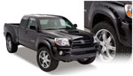 Bushwacker 05-11 Toyota Tacoma Fleetside Pocket Style Flares 4pc 73.5in Bed - Black; 2005-2011