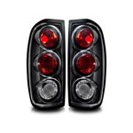 Winjet 1998-2004 Nissan Frontier Altezza Tail Light - Black / Clear; 1998-2004