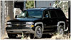 Bushwacker 40910-02 | 00-06 Chevy Tahoe OE Style Flares 4pc 4-Door - Black; 2000-2006 Alternate Image 5